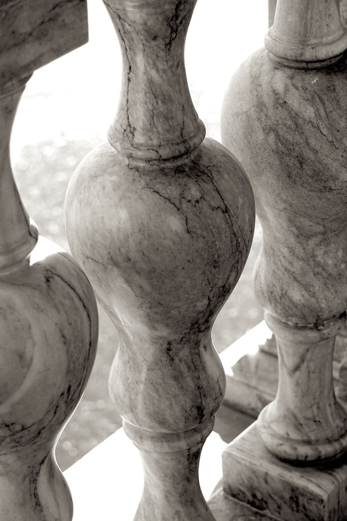 services-img Detailed view of marble balustrade showcasing intricate craftsmanship and classic design elements.